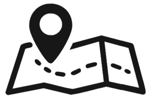 Folded map with a large location pin marking a destination